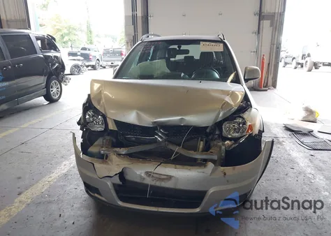 2010 Suzuki Sx4 Technology z USA, uszkodzony, nr VIN JS2YB5A39A6302670